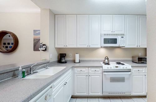 Amelia City Condo | Elegant, oceanfront condo with balcony, washer/dryer & on-site pool