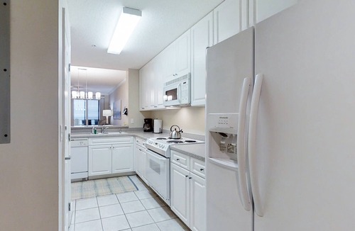 Amelia City Condo | Elegant, oceanfront condo with balcony, washer/dryer & on-site pool