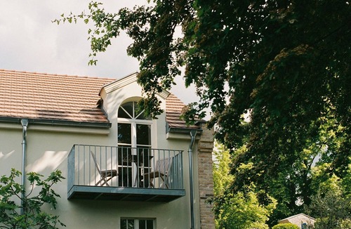 Werder Apartment | REMISE STUDIO: Garden view, balcony and water access
