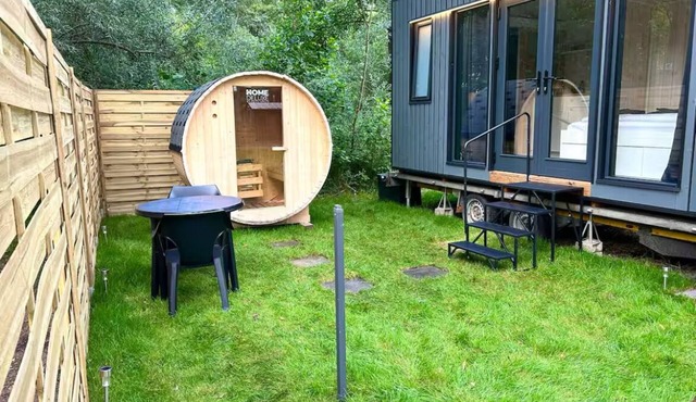 Charming tiny house by the lake with outdoor sauna